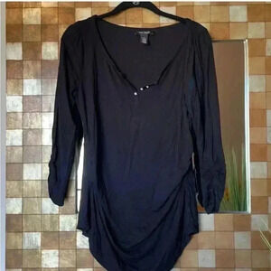 WHBM pearl button long sleeve black top. Size M